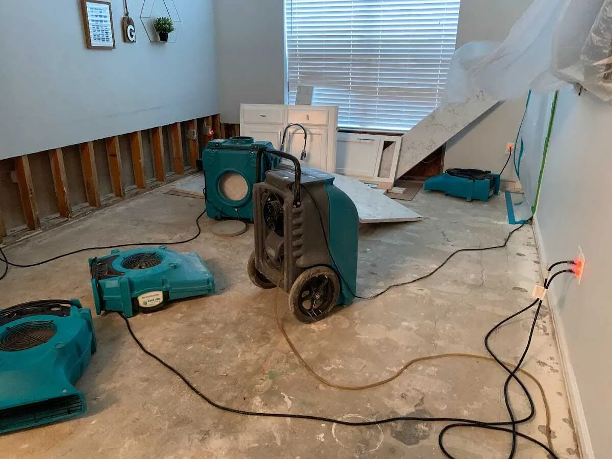 Dehumidifier in flood-cut room for Water Damage Restoration in Crystal Lake